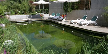 Golfurlaub - Wellnessbereich - Bayern - Naturschwimmteich (Pool) - Wunsch Hotel Mürz - Natural Health & Spa