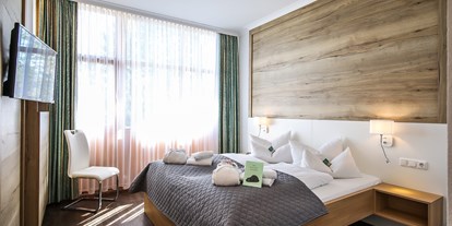 Golfurlaub - Wellnessbereich - Bayern - Junior Suite Schlafraum - AktiVital Hotel 