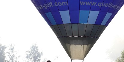 Golfurlaub - Handtuchservice - Bäderdreieck - Unser Heißluftballon beim landen auf dem Beckenbauer Course - Gutshof Penning