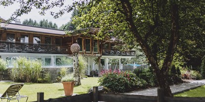 Golfurlaub - Bademantel - Pinzgau - Garten - Hotel Sonne