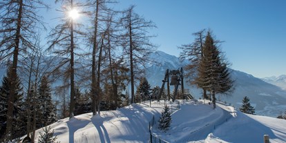 Golfurlaub - Umgebungsschwerpunkt: Berg - Tirol - Die Friedensglocke im Alpenraum - bei uns im Garten - läutet täglich für den Frieden in den Alpenländern - Inntalerhof - DAS Panoramahotel