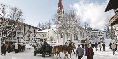 Golfurlaub - Umgebungsschwerpunkt: Berg - Tirol - Fußgängerzone Seefeld in Tirol - alpinen Lifestyle im Sommer wie im Winter genießen - Inntalerhof - DAS Panoramahotel
