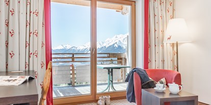Golfurlaub - Zimmersafe - Tirol - Wohnkomfort im Doppelzimmer Weitsicht Deluxe - Inntalerhof - DAS Panoramahotel