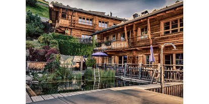 Golfurlaub - Doppelwaschbecken - Tirol - HochLeger Chalets Aussenansicht - HochLeger Luxury Chalet Resort