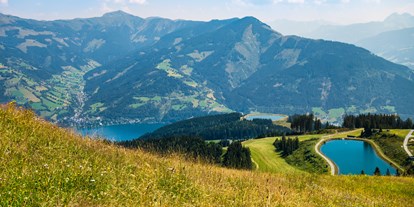 Golfurlaub - Pools: Außenpool beheizt - Salzburg - Bergsee auf der Schmittenhöhe mit Blick auf den Zeller See - Hotel Sonnblick