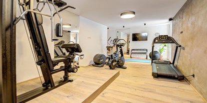 Golfurlaub - Zimmersafe - Tirol - Fitnessraum - KOSIS Sports Lifestyle Hotel