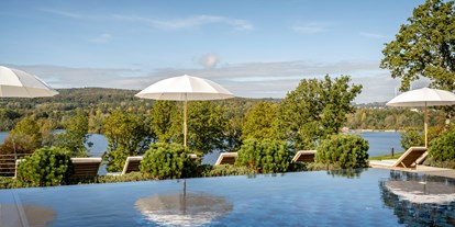 Golfurlaub - Pools: Schwimmteich - Seezeitlodge Hotel & Spa