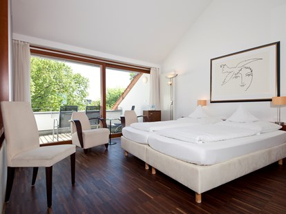 Golfurlaub - Handtuchservice - Designzimmer - Romantik Hotel Johanniter-Kreuz