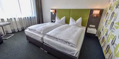 Golfurlaub - Handtuchservice - Bad Dürkheim - Comfortzimmer - Hotel Vorfelder
