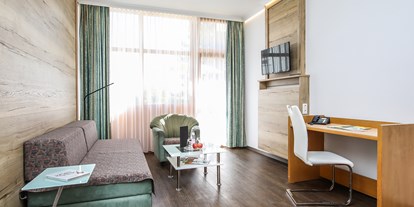 Golfurlaub - Hotel-Schwerpunkt: Golf & Gesundheit - Röhrnbach - Junior Suite Wohnraum - AktiVital Hotel 