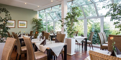 Golfurlaub - Abendmenü: 3 bis 5 Gänge - Tettenweis - Wintergarten im Restaurant - AktiVital Hotel 