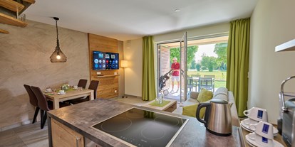 Golfurlaub - Sonnenterrasse - 5* Ferienhaus - Apartment, Typ 1 mittlere Lage - Bachhof Resort Straubing - Hotel und Apartments