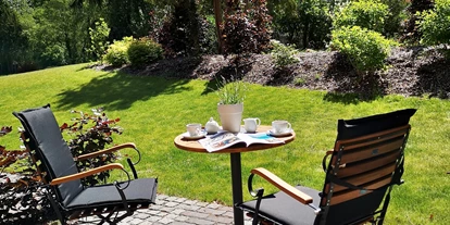 Golfurlaub - WLAN - Bülstedt - Deluxe Doppelzimmer: Genießen Sie die Sonnenstrahlen auf Ihrer privaten Terrasse. - Nordenholzer Hofhotel