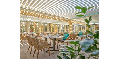 Golfurlaub - Zimmersafe - Fürsteneck - Restaurant-Innenhof-Terrasse - Hartls Parkhotel Bad Griesbach