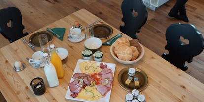 Golfurlaub - Hörzendorf - täglicher Frühstücks-Service - Trattlers Hof-Chalets
