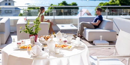 Golfurlaub - Pools: Außenpool beheizt - Tarvisio - Frühstück auf der Sundowner Longe  - Werzer's Hotel Resort Pörtschach