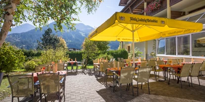 Golfurlaub - Hotel-Schwerpunkt: Golf & Sightseeing - Übersee - Geniessen Sie die wunderbare Aussicht oder Ihre Mahlzeiten auf unserer Sonnenterrasse. - Hotel Alpenhof Brixen