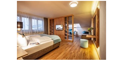 Golfurlaub - Shuttle-Service zum Golfplatz - Füssen - Juniorsuite Relax - Hotel Bergland All Inclusive Top Quality