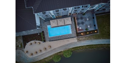 Golfurlaub - Pools: Außenpool beheizt - Korswandt - Poolbereich von oben - Dorint Resort Baltic Hills Usedom