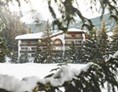 Golfhotel: Aussenansicht Winter - Hotel Waldhuus Davos