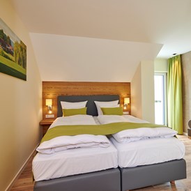 Golfhotel: Bachhof Ferienhaus Schlafzimmer - Bachhof Resort Straubing - Hotel und Apartments