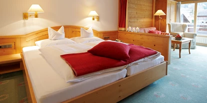 Golfurlaub - PLZ 6707 (Österreich) - Wohnschlafzimmer  Deluxe mit Balkon - Alpenhotel Montafon