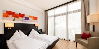 Golfurlaub - Zimmer mit Fernsicht - Königsleiten - Komfortzimmer mit Balkon im Hotel Heitzmann***s - Hotel Heitzmann ***s 