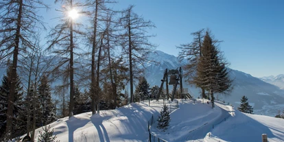 Golfurlaub - Bad und WC getrennt - Die Friedensglocke im Alpenraum - bei uns im Garten - läutet täglich für den Frieden in den Alpenländern - Inntalerhof - DAS Panoramahotel
