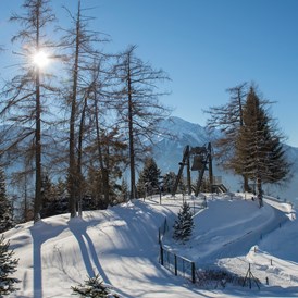 Golfhotel: Die Friedensglocke im Alpenraum - bei uns im Garten - läutet täglich für den Frieden in den Alpenländern - Inntalerhof - DAS Panoramahotel