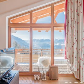 Golfhotel: Wohnkomfort in unserer Lichtblick Suite mit beeindruckendem Panoramablick - Inntalerhof - DAS Panoramahotel