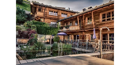 Golfurlaub - Sauna - HochLeger Chalets Aussenansicht - HochLeger Luxury Chalet Resort
