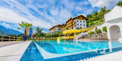 Golfurlaub - Sauna - Freibad mit Wasserrutsche - Hotel Glocknerhof ****