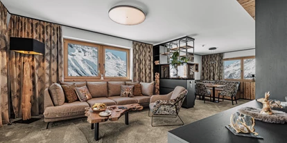 Golfurlaub - Fahrstuhl - Chalet Wohnzimmer - SKI | GOLF | WELLNESS Hotel Riml****S