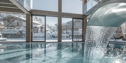 Golfurlaub - Sauna - INNs HOLZ Natur- & Vitalhotel****s Ausblick vom Indoorpool im Winter - INNs HOLZ Natur- & Vitalhotel****s