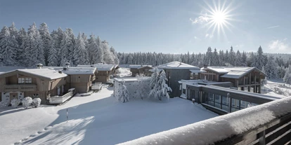 Golfurlaub - Sauna - INNs HOLZ Chaletdorf Resort im Winter - INNs HOLZ Chaletdorf