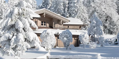 Golfurlaub - Sauna - INNs HOLZ Chalet im Winter - INNs HOLZ Chaletdorf