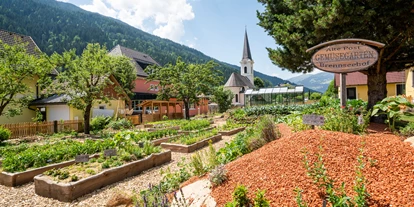 Golfurlaub - Restaurant - hoteleigener Permakultur-Garten - Familien-Sportresort Brennseehof