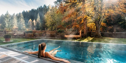 Golfurlaub - Sauna - Neuer beheizter Außenpool - Hotel GUT Trattlerhof & Chalets****S