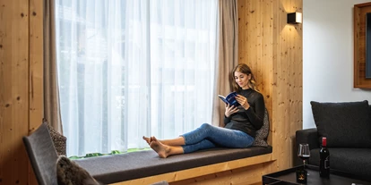 Golfurlaub - Sauna - Panoramafenster im Chalet Deluxe - Trattlers Hof-Chalets