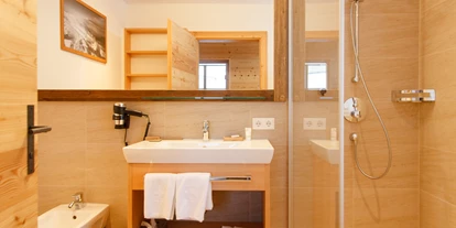 Golfurlaub - Sauna - Badezimmer Chalet - Trattlers Hof-Chalets
