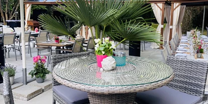 Golfurlaub - Restaurant - Garten  - Restaurant Niedmühle | Land & Genuss Hotel