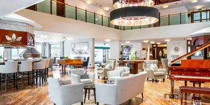 Golfurlaub - Fahrstuhl - "The Gallery" Lobby, Restaurant, Bar - EUROPÄISCHER HOF Bad Gastein