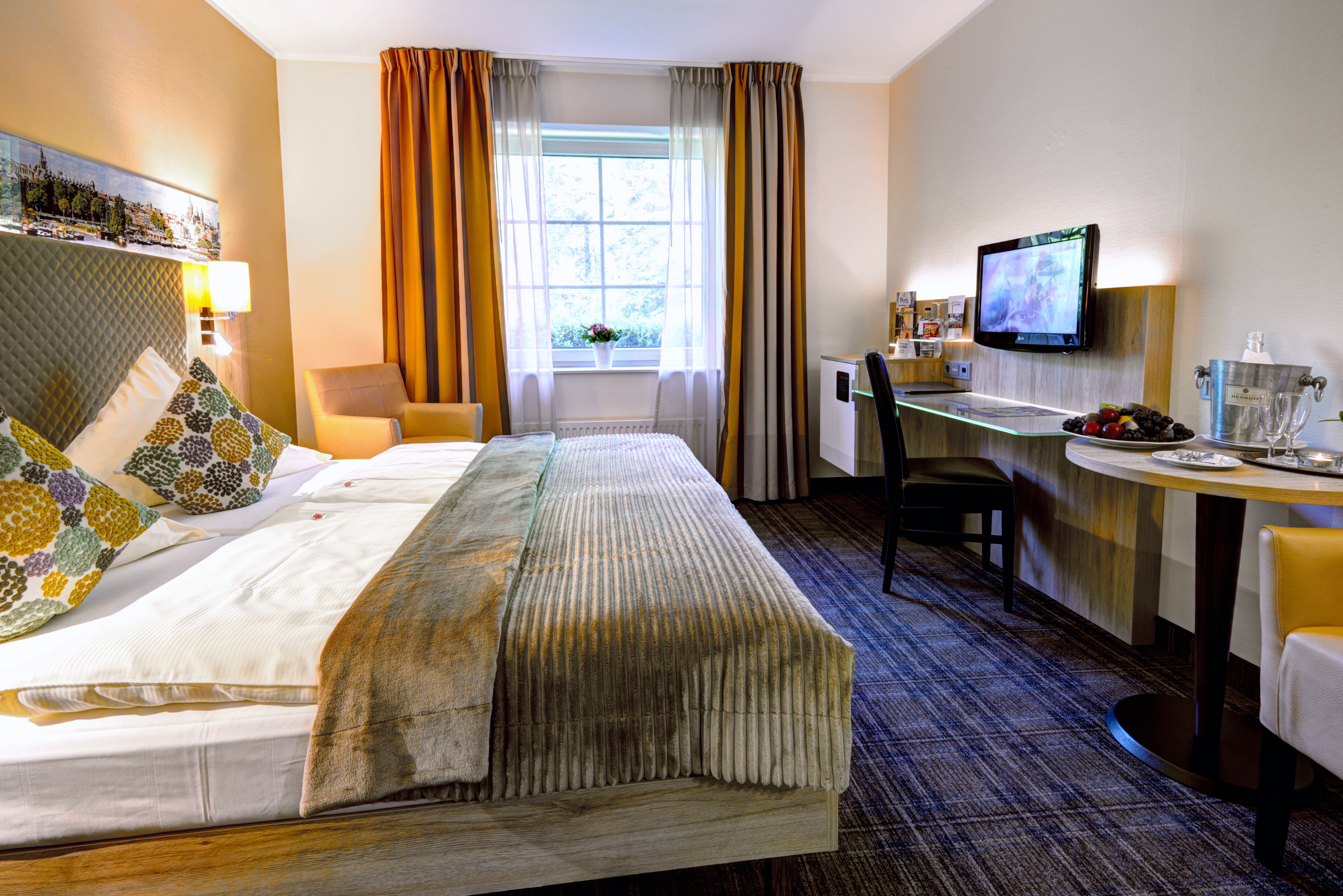 Golfurlaub - Wäscheservice - Comfortzimmer Garten (B) - NordWest-Hotel "Amsterdam"