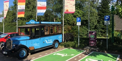 Golfurlaub - Deutschland - Ladestation für E-Autos mit zwei Ladepunkten, 22 KW mit allen gängigen Ladekarten u. EC-Karte - NordWest-Hotel "Amsterdam"