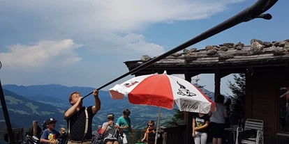 Golfurlaub - Fahrstuhl - Almnachmittag auf der Schermer-Alm "Scheibenschlag" - Landhotel Schermer