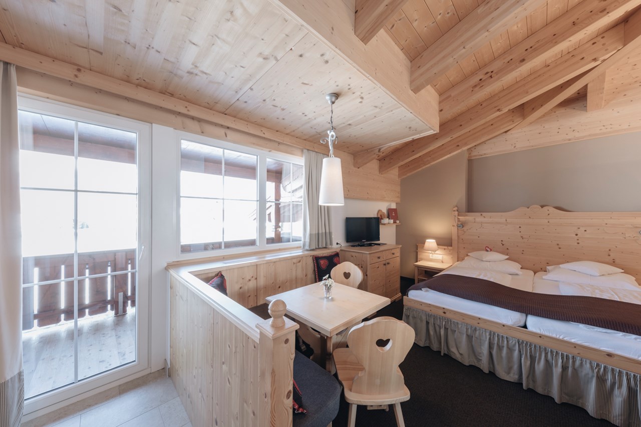 Der Greil Zimmerkategorien Kaiser-Familiensuite mit Sichtdachstuhl