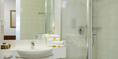 Golfurlaub - Restaurant - Badezimmer Herrenhaus - Tennis Golf Hotel Höllrigl