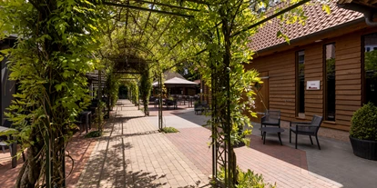 Golfurlaub - Restaurant - Garten & Terrasse - Hotel Heidegrund