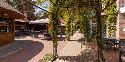 Golfurlaub - Restaurant - Garten & Terrasse - Hotel Heidegrund
