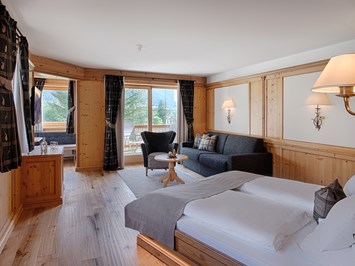 Das Majestic Zimmerkategorien  DZ TÜRML  - 47m² ,  Wohlig warmes Ambiente in traditionell alpinem Design